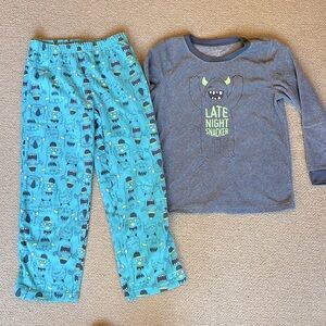 Cozy fleece, two piece set monster pajamas, youth size 7 by Carter’s.